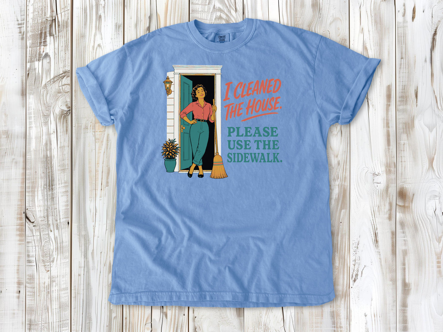 Pepper garment-dyed tee with I Cleaned the House Please Use the Sidewalk cleaning graphic.