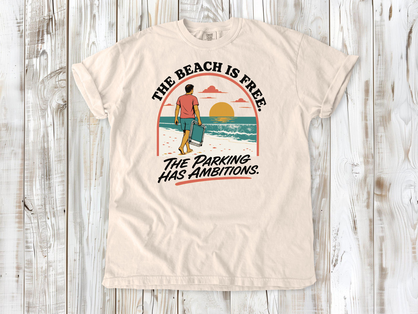 Butter garment-dyed tee with The Beach Is Free The Parking Has Ambitions coastal graphic.
