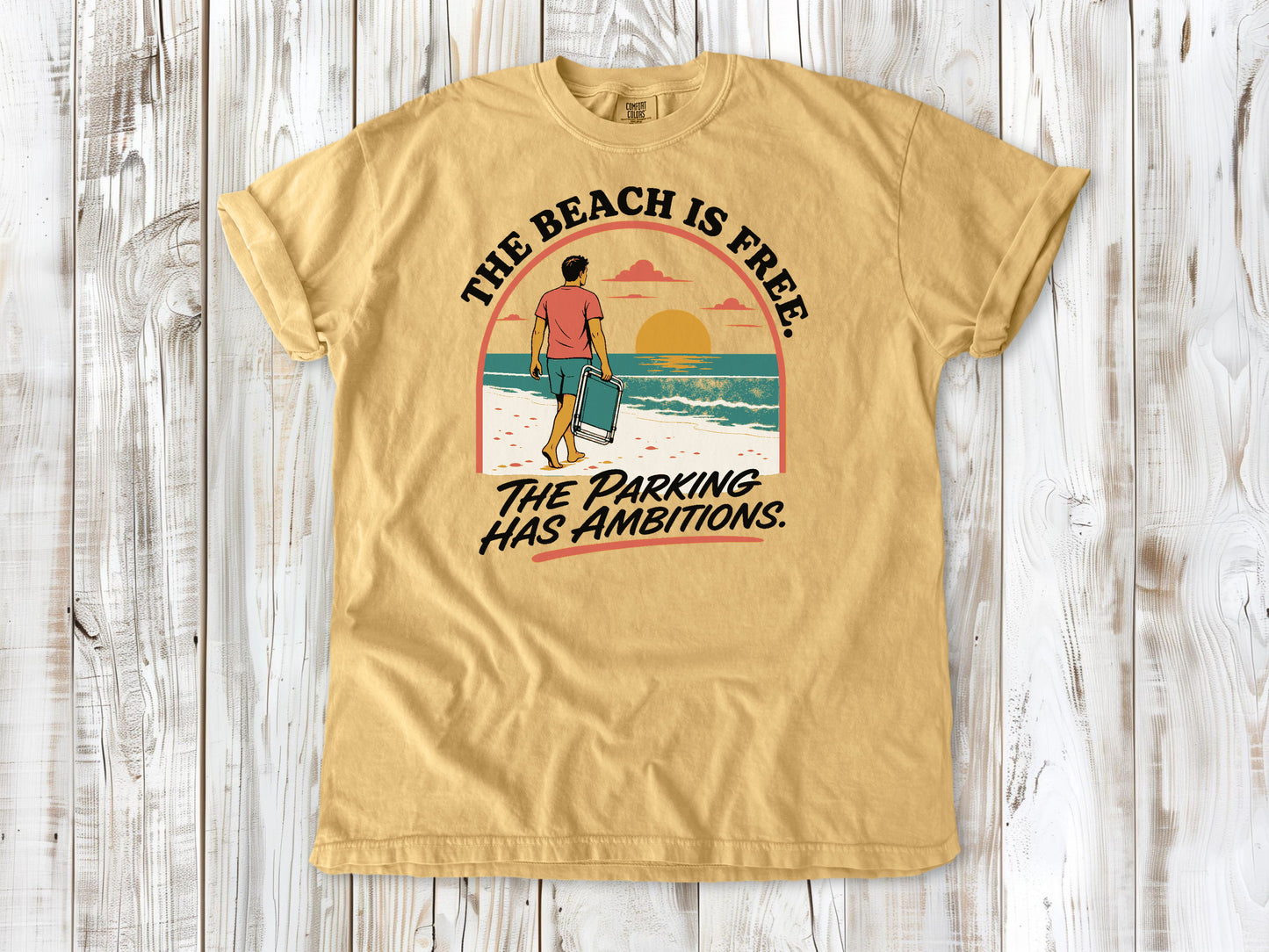 Burnt Orange garment-dyed tee with The Beach Is Free The Parking Has Ambitions coastal graphic.