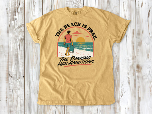 Burnt Orange garment-dyed tee with The Beach Is Free The Parking Has Ambitions coastal graphic.