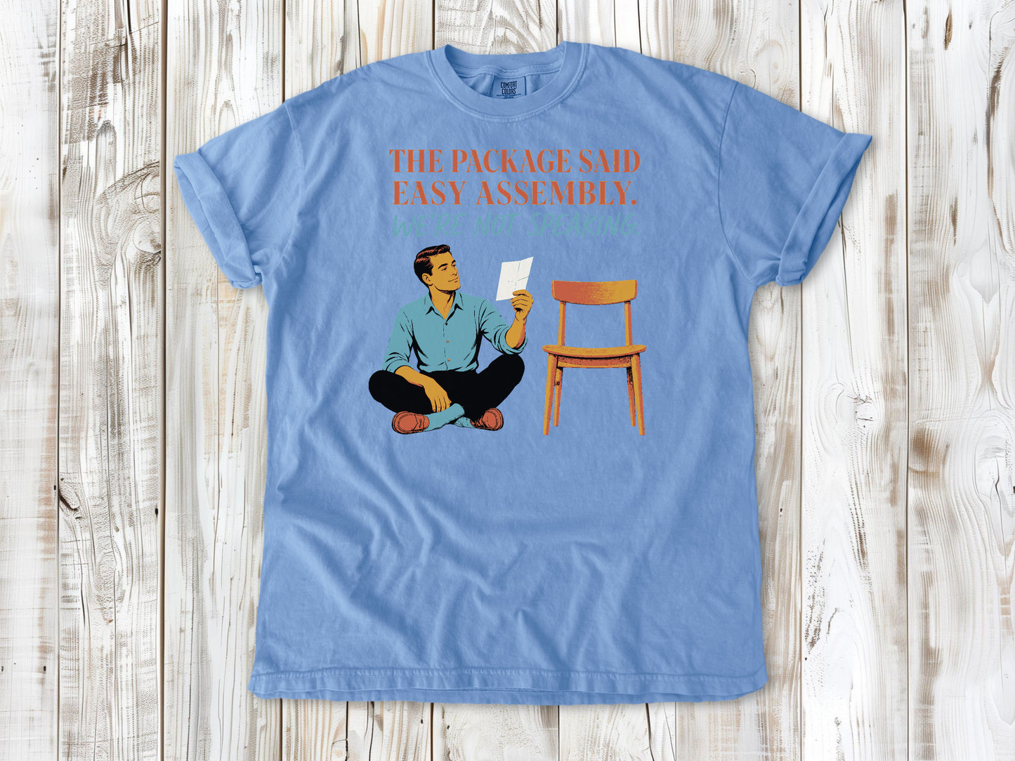 Pepper garment-dyed tee with The Package Said Easy Assembly We're Not Speaking DIY graphic.