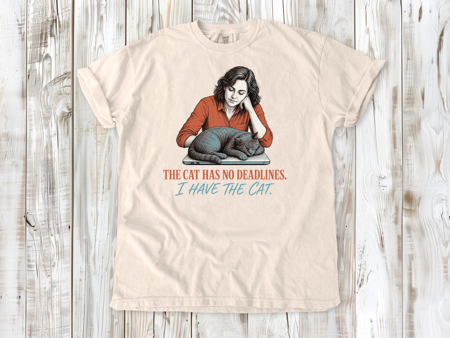 Butter garment-dyed tee with The Cat Has No Deadlines I Have the Cat remote work graphic.
