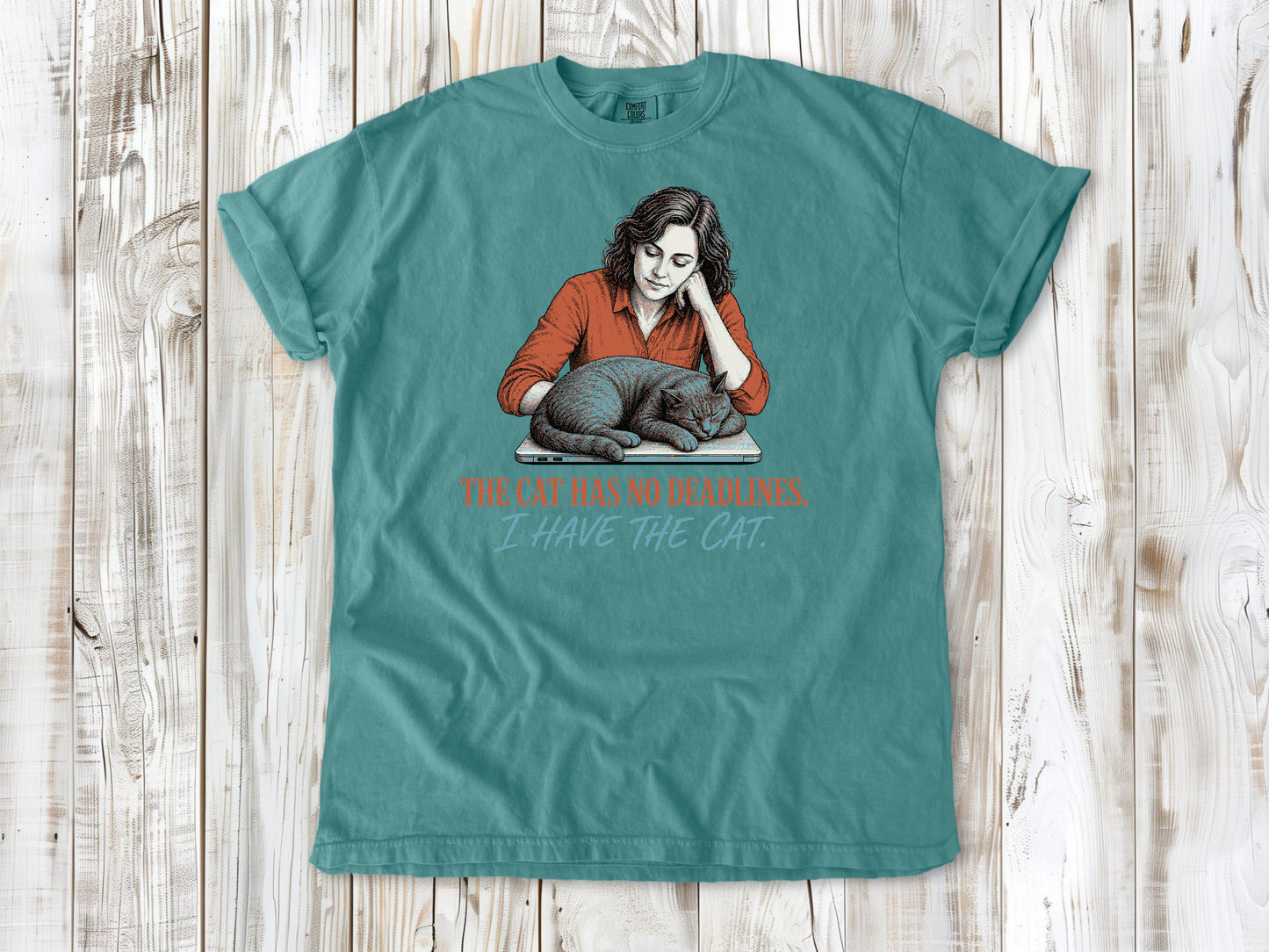Mustard garment-dyed tee with The Cat Has No Deadlines I Have the Cat remote work graphic.