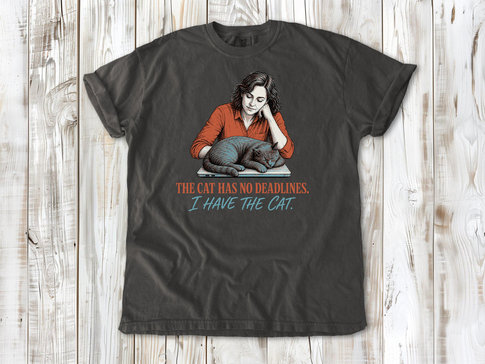Ivory garment-dyed tee with The Cat Has No Deadlines I Have the Cat remote work graphic.