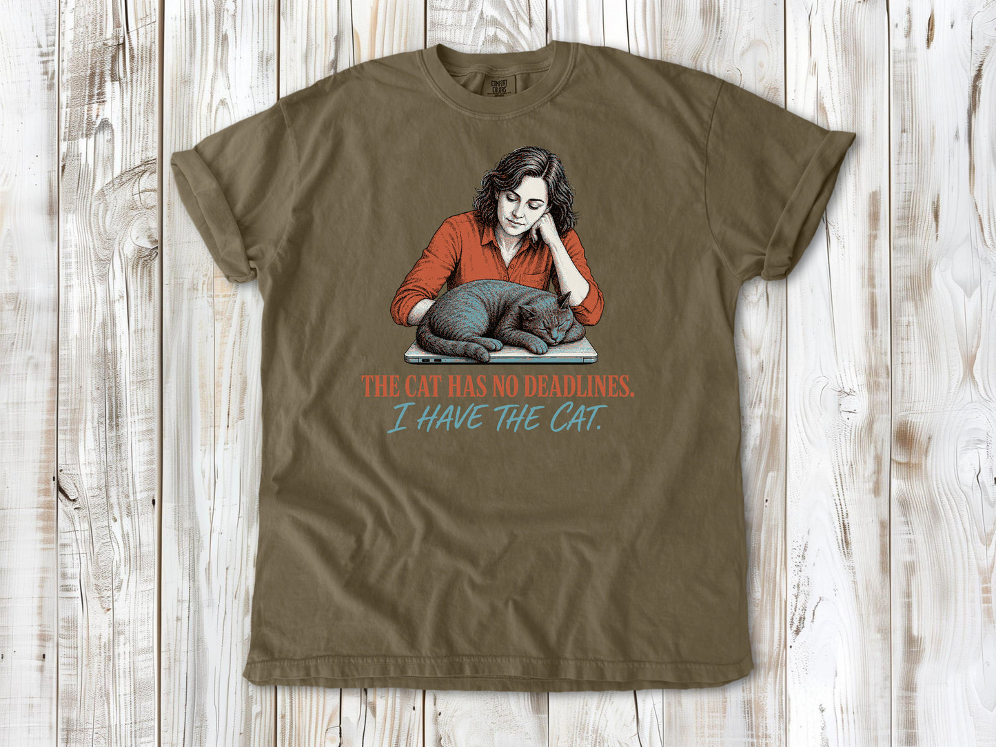 Graphite garment-dyed tee with The Cat Has No Deadlines I Have the Cat remote work graphic.