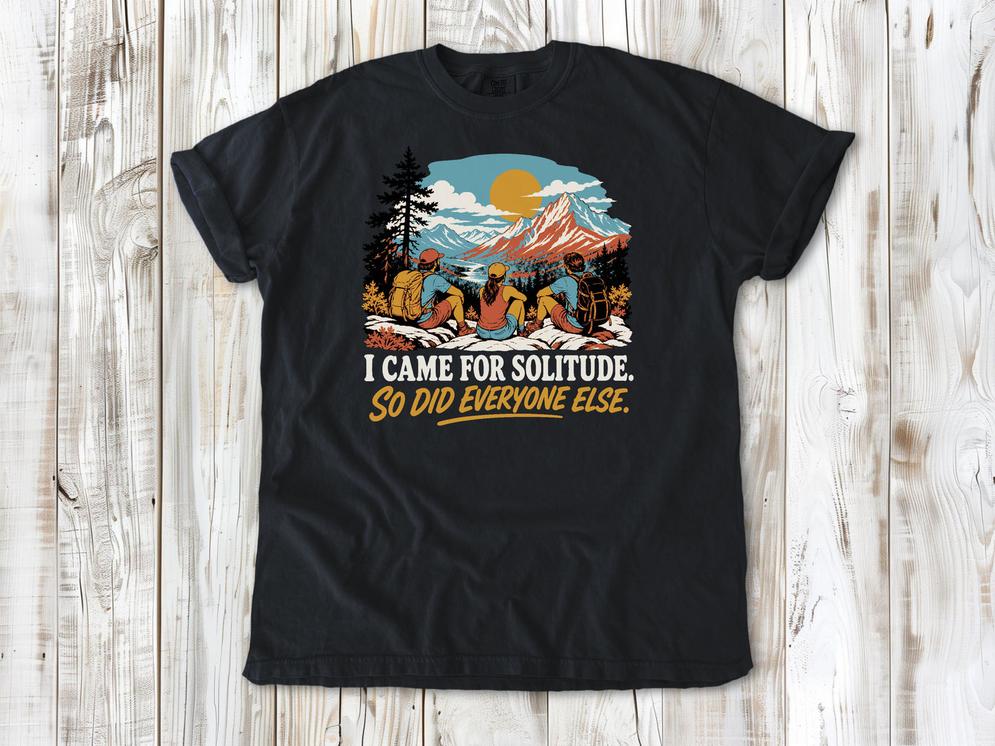 Washed Denim garment-dyed tee with I Came for Solitude So Did Everyone Else hiking graphic.