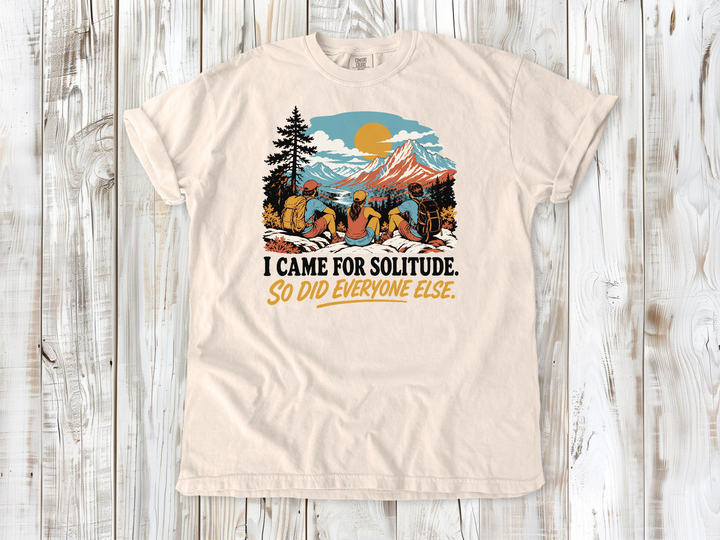 Butter garment-dyed tee with I Came for Solitude So Did Everyone Else hiking graphic.