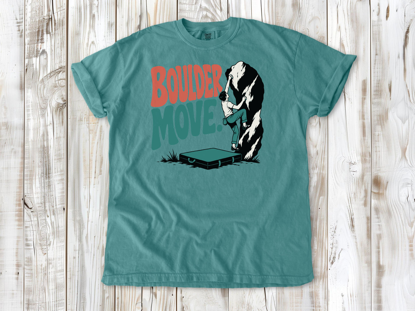 Mustard garment-dyed tee with Boulder Move bouldering graphic.