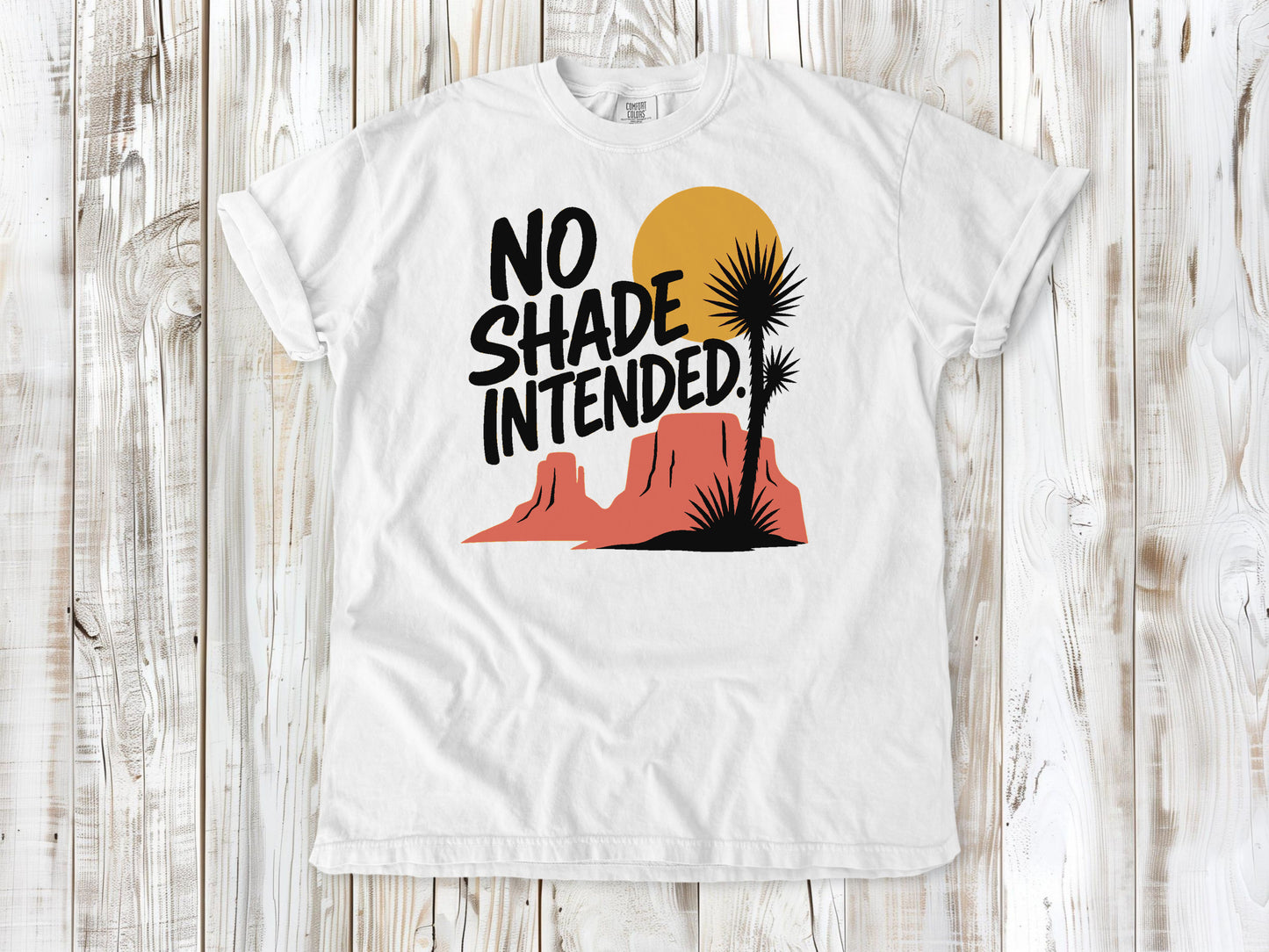 White garment-dyed tee with No Shade Intended desert hiking graphic.