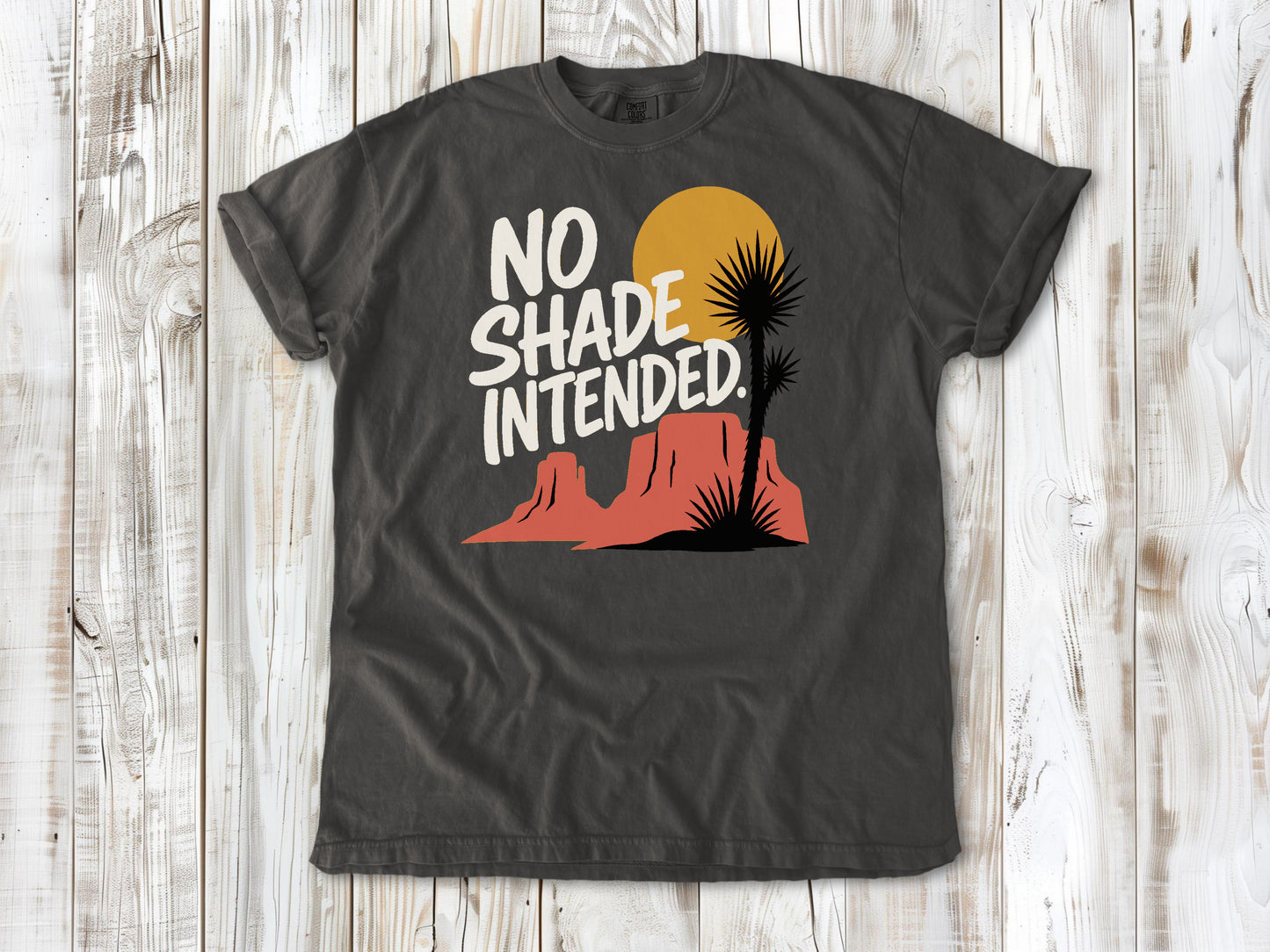 Ivory garment-dyed tee with No Shade Intended desert hiking graphic.