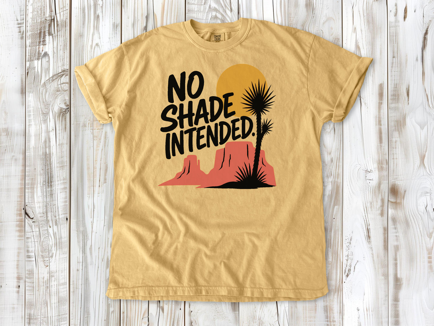 Burnt Orange garment-dyed tee with No Shade Intended desert hiking graphic.