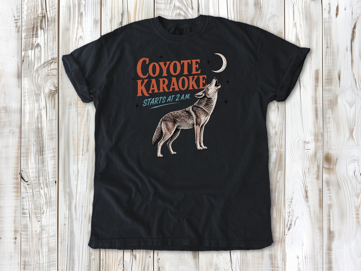 Washed Denim garment-dyed tee with Coyote Karaoke Starts at 2 AM camping graphic.