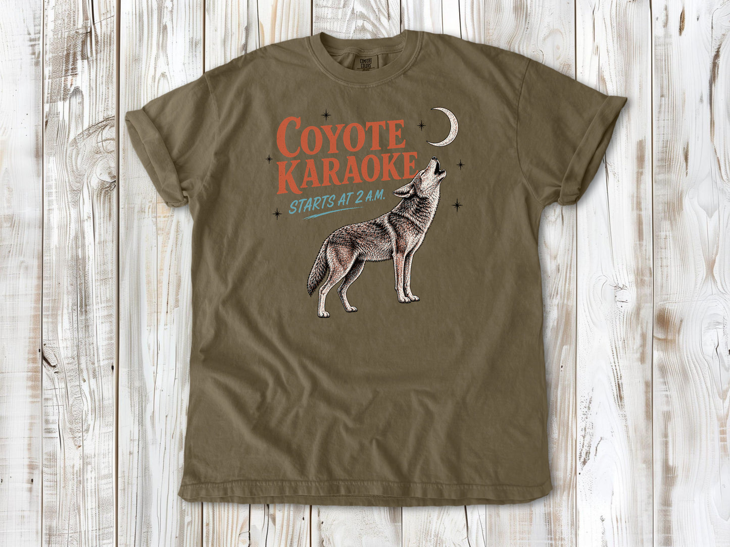 Graphite garment-dyed tee with Coyote Karaoke Starts at 2 AM camping graphic.