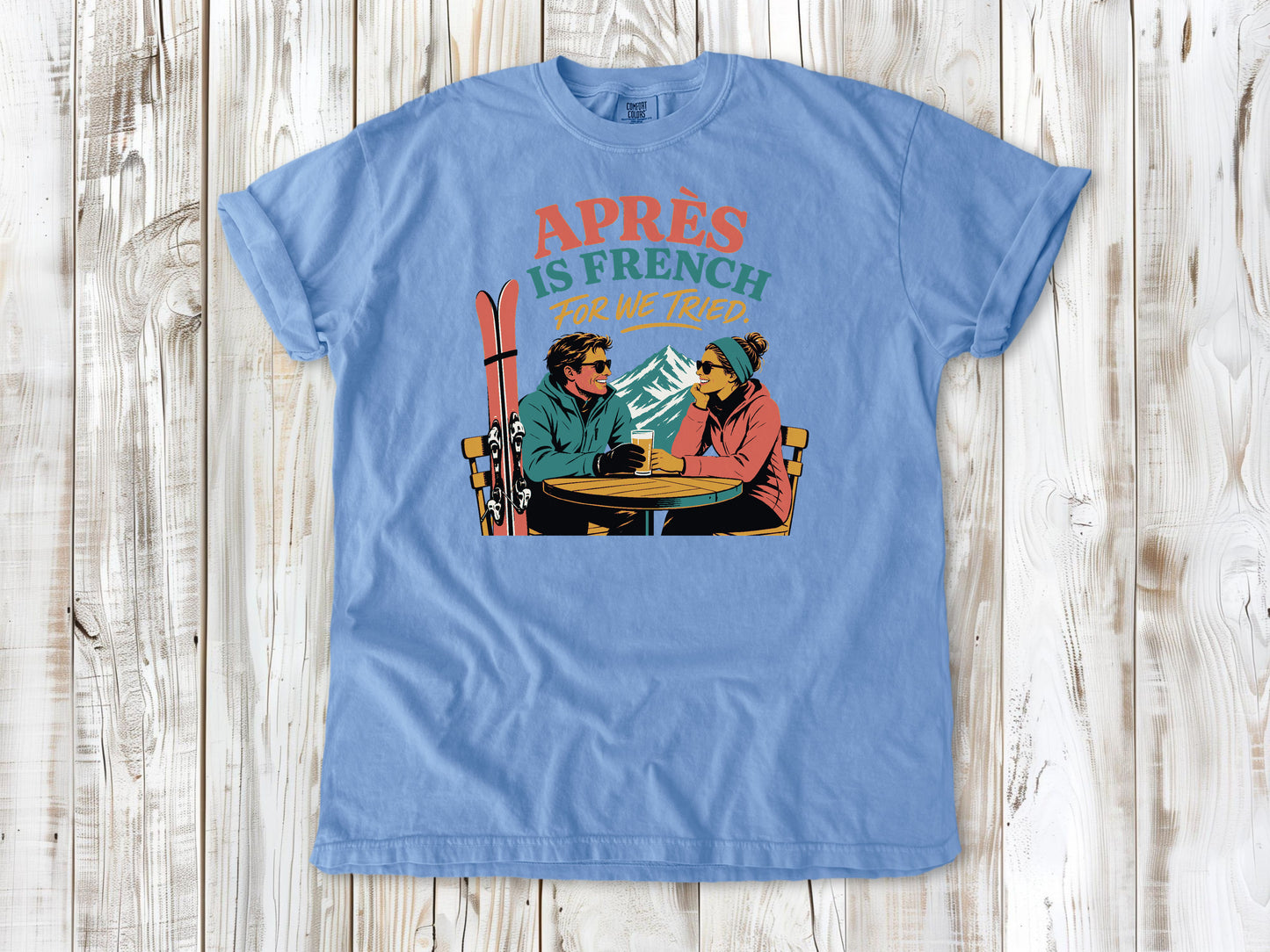 Pepper garment-dyed tee with Après Is French for We Tried skiing graphic.