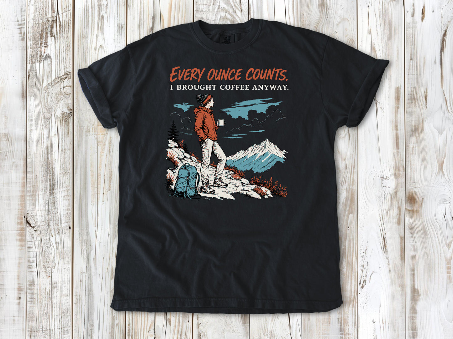 Washed Denim garment-dyed tee with Every Ounce Counts I Brought Coffee Anyway backpacking graphic.