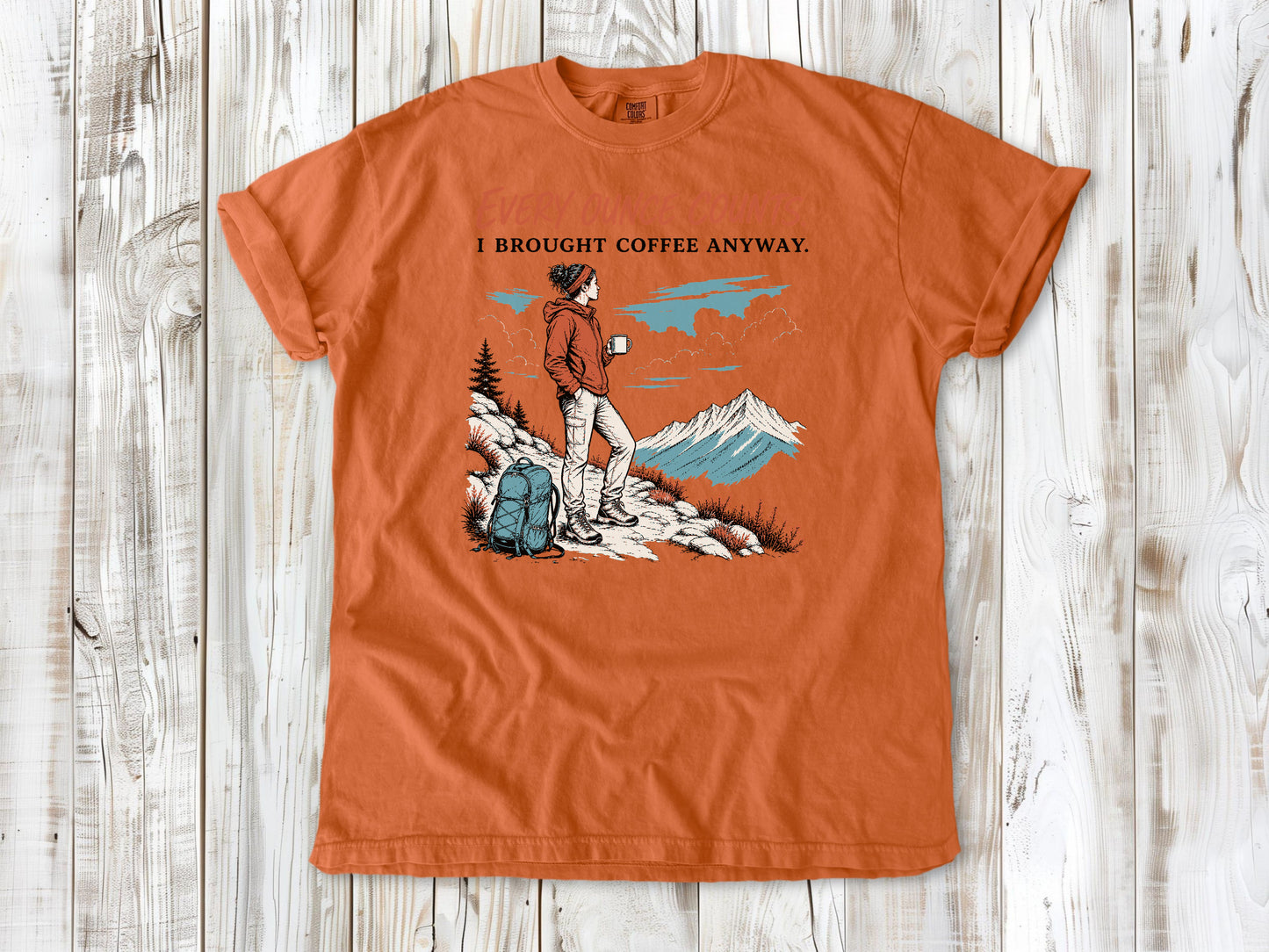 Seafoam garment-dyed tee with Every Ounce Counts I Brought Coffee Anyway backpacking graphic.