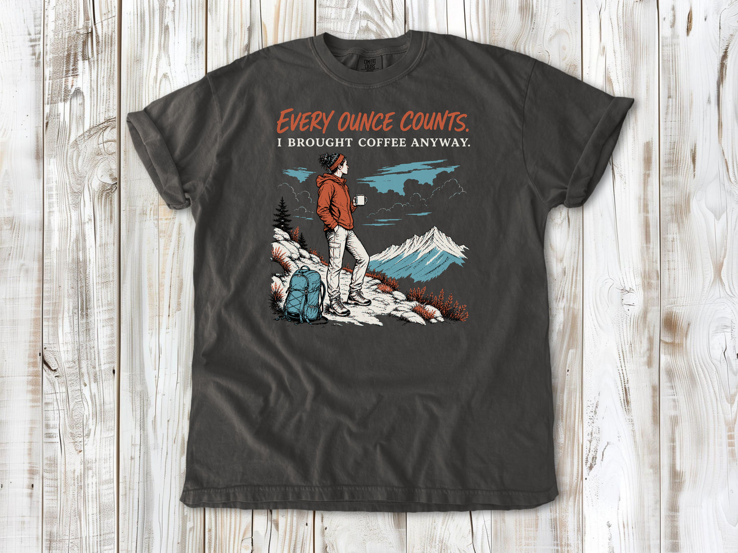 Ivory garment-dyed tee with Every Ounce Counts I Brought Coffee Anyway backpacking graphic.