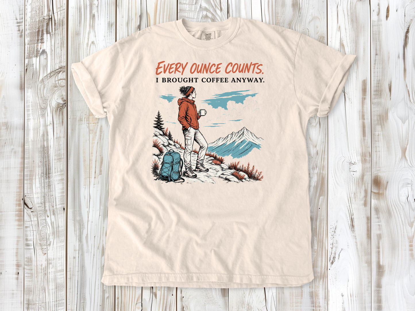 Butter garment-dyed tee with Every Ounce Counts I Brought Coffee Anyway backpacking graphic.