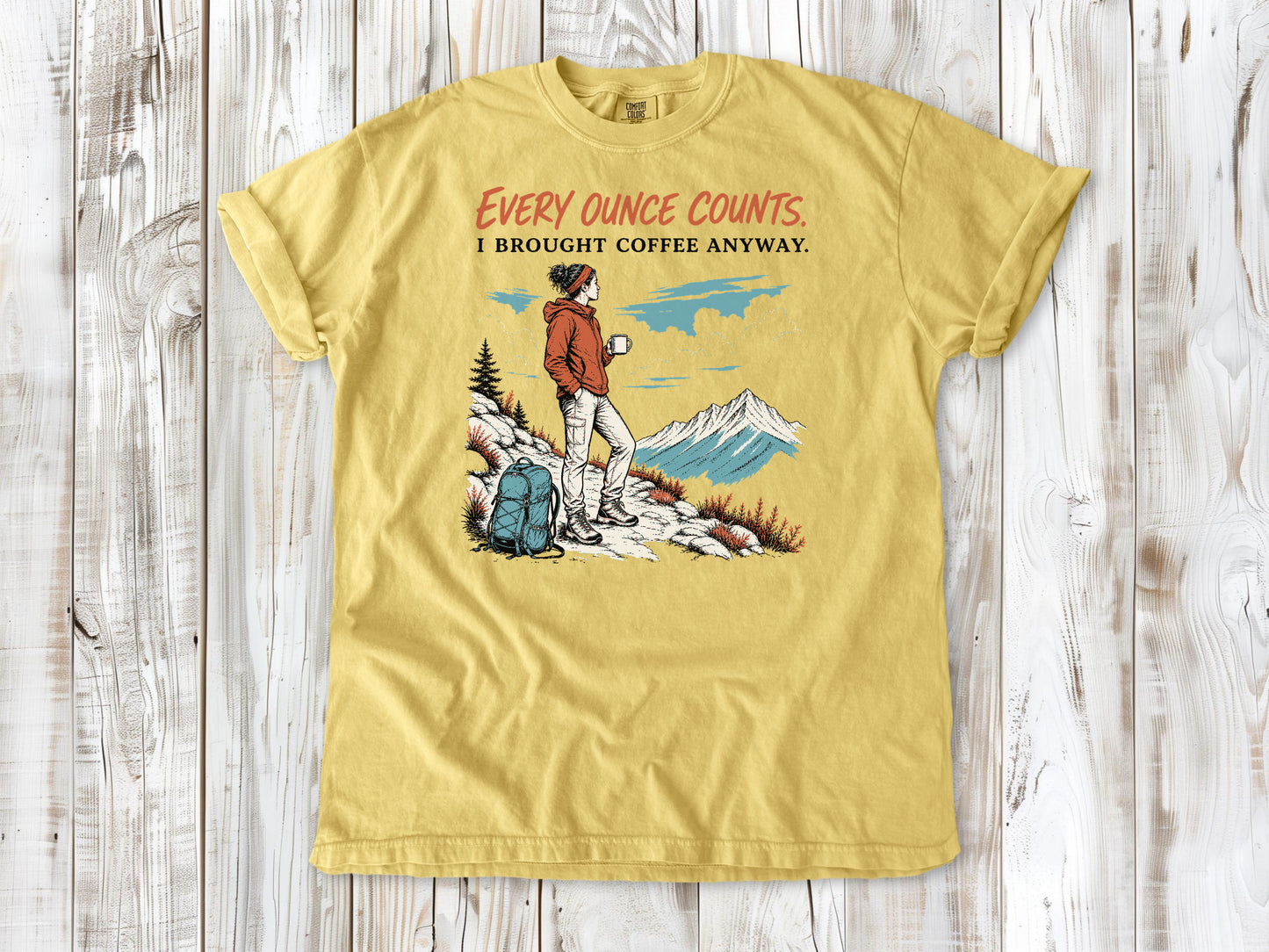 Grey garment-dyed tee with Every Ounce Counts I Brought Coffee Anyway backpacking graphic.