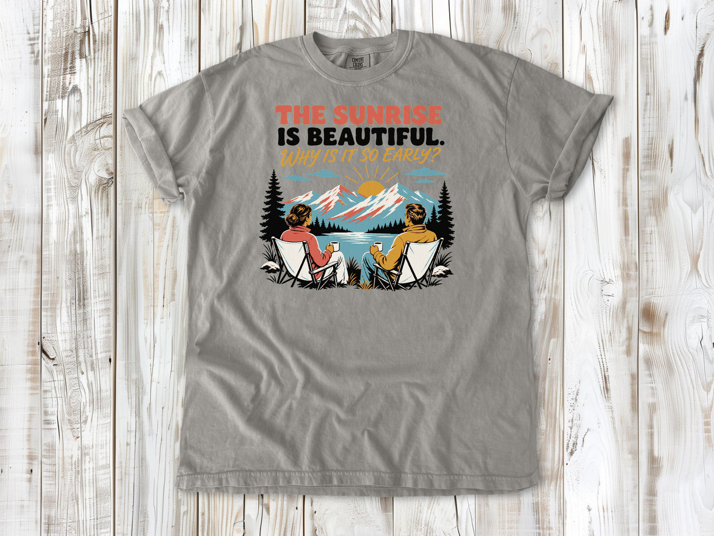 Khaki garment-dyed tee with The Sunrise Is Beautiful Why Is It So Early outdoor graphic.
