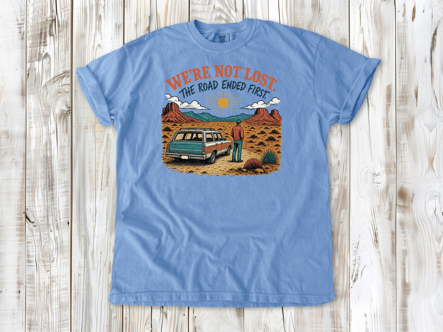 Pepper garment-dyed tee with We're Not Lost The Road Ended First off-road graphic.