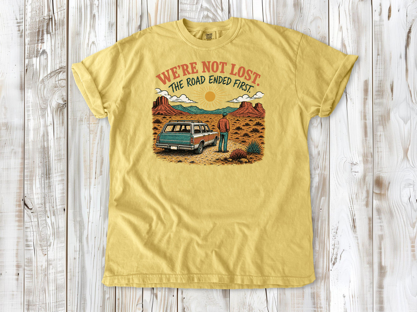 Grey garment-dyed tee with We're Not Lost The Road Ended First off-road graphic.