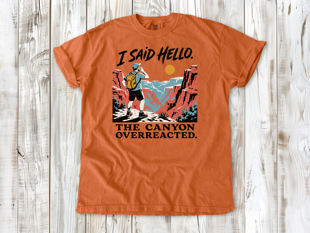 Seafoam garment-dyed tee with I Said Hello The Canyon Overreacted hiking graphic.
