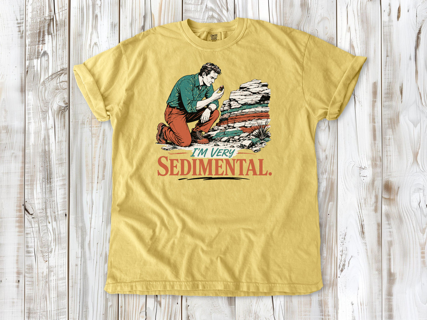 Grey garment-dyed tee with I'm Very Sedimental rockhound graphic.