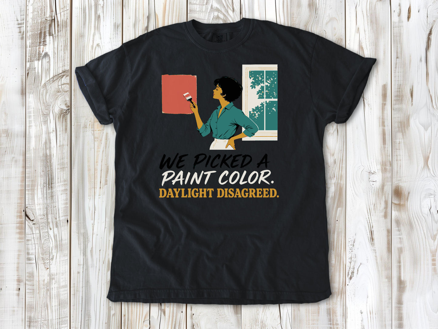 Washed Denim garment-dyed tee with We Picked a Paint Color Daylight Disagreed painting graphic.