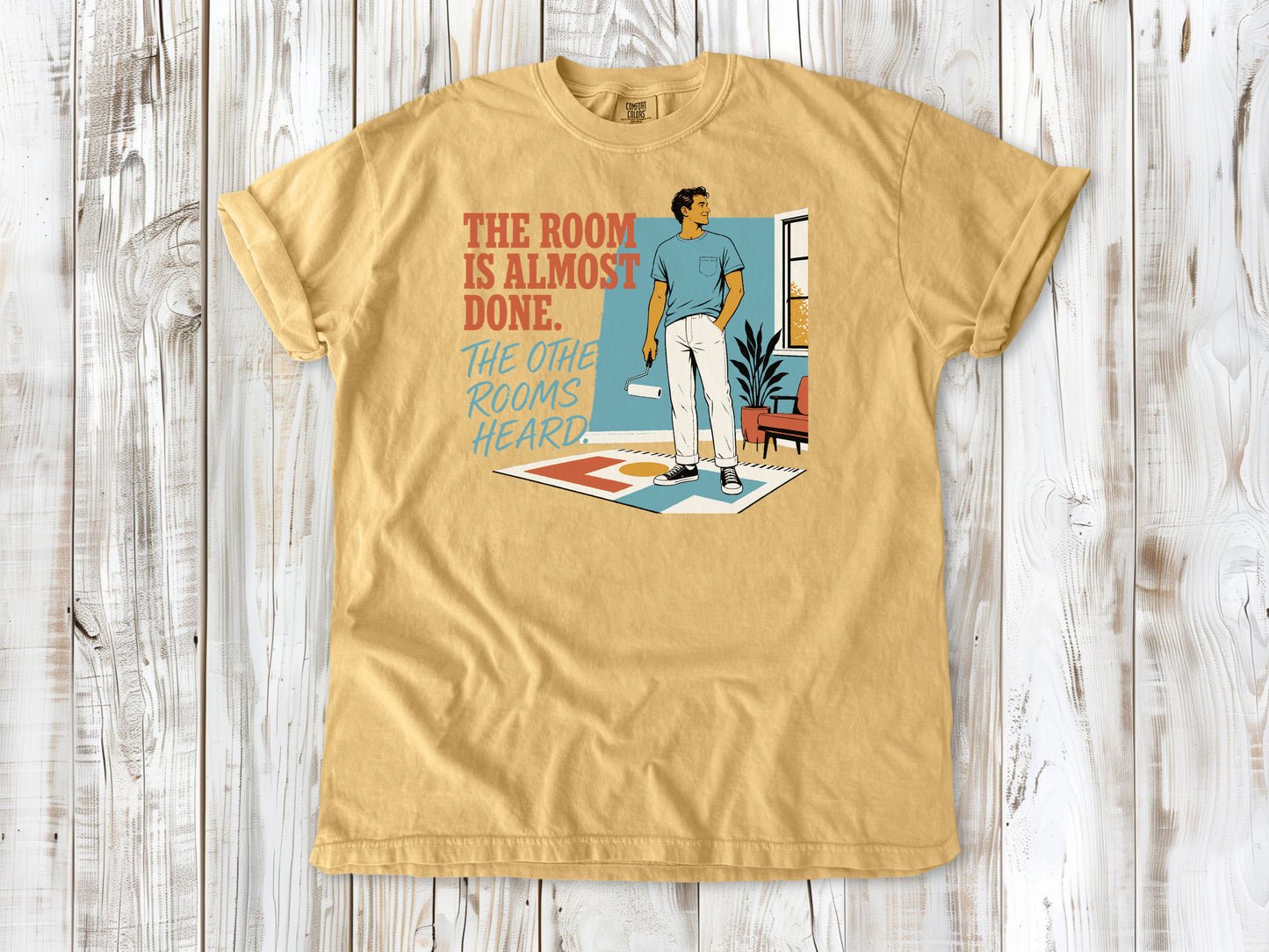 Burnt Orange garment-dyed tee with The Room Is Almost Done The Other Rooms Heard renovation graphic.