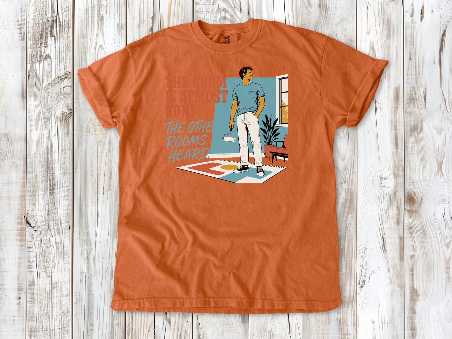 Seafoam garment-dyed tee with The Room Is Almost Done The Other Rooms Heard renovation graphic.