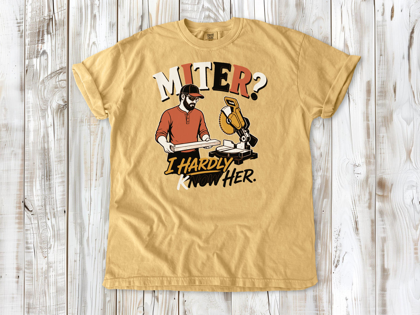 Burnt Orange garment-dyed tee with Miter I Hardly Know Her woodworking graphic.