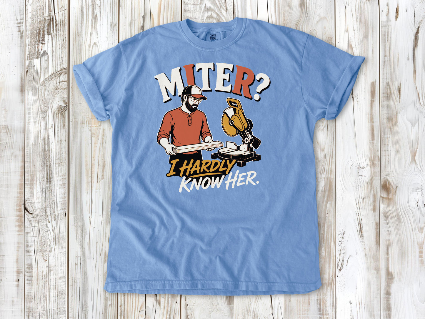 Pepper garment-dyed tee with Miter I Hardly Know Her woodworking graphic.