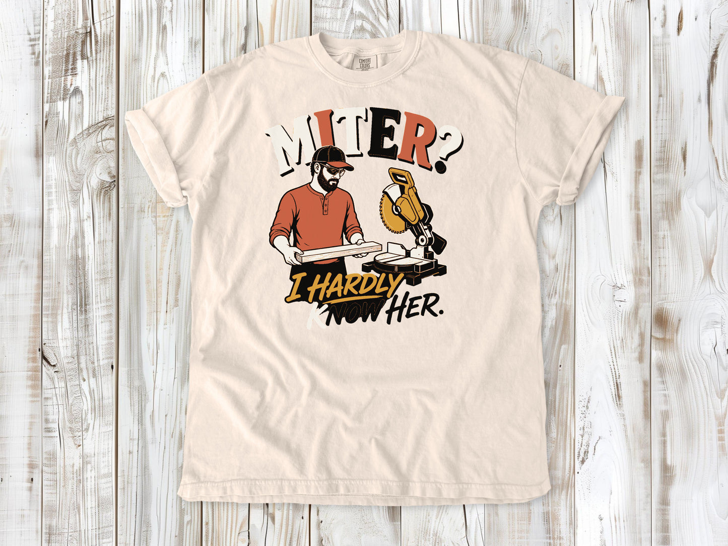 Butter garment-dyed tee with Miter I Hardly Know Her woodworking graphic.