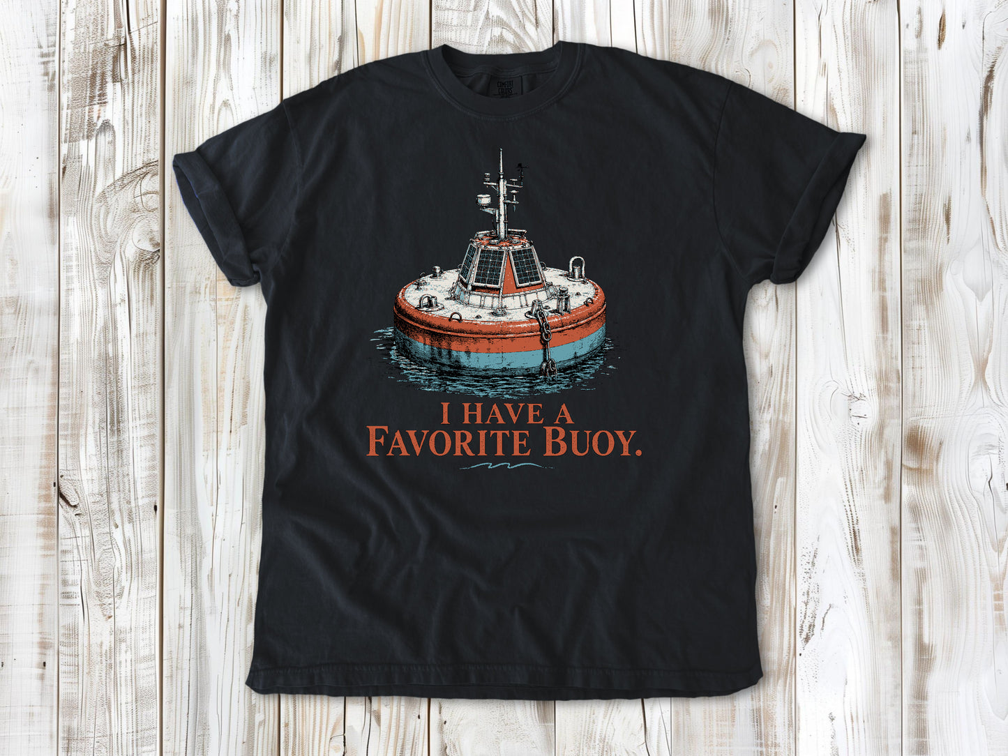Washed Denim garment-dyed tee with I Have a Favorite Buoy surfing graphic.