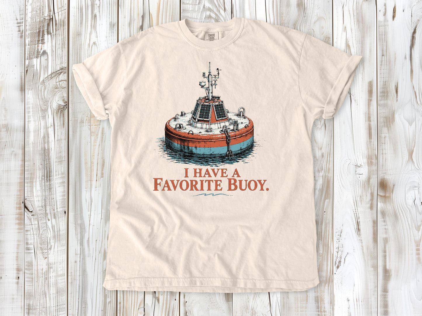 Butter garment-dyed tee with I Have a Favorite Buoy surfing graphic.