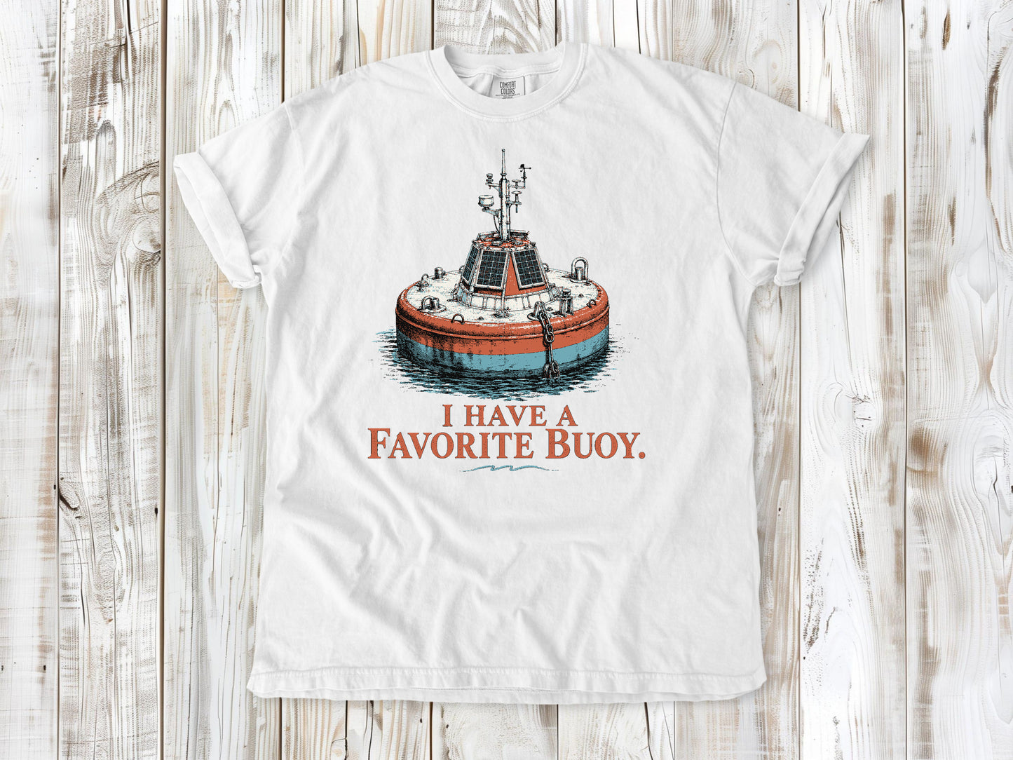 White garment-dyed tee with I Have a Favorite Buoy surfing graphic.