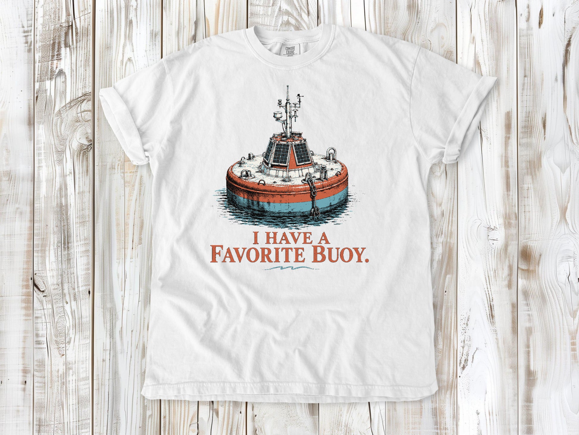 White garment-dyed tee with I Have a Favorite Buoy surfing graphic.