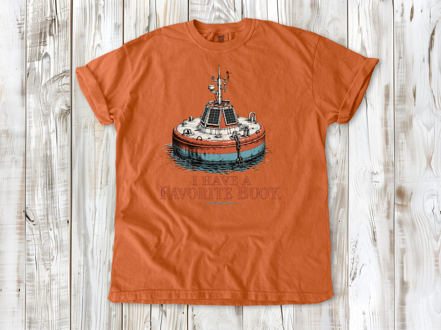 Seafoam garment-dyed tee with I Have a Favorite Buoy surfing graphic.