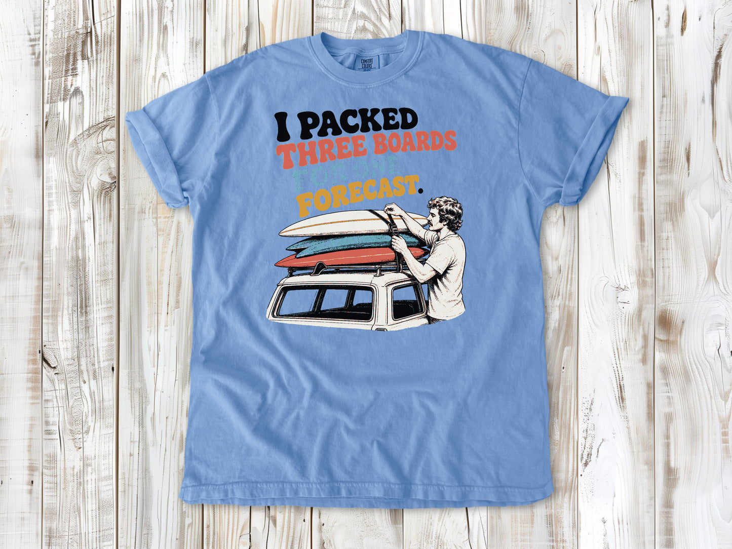 Pepper garment-dyed tee with I Packed Three Boards for One Forecast surfboard graphic.