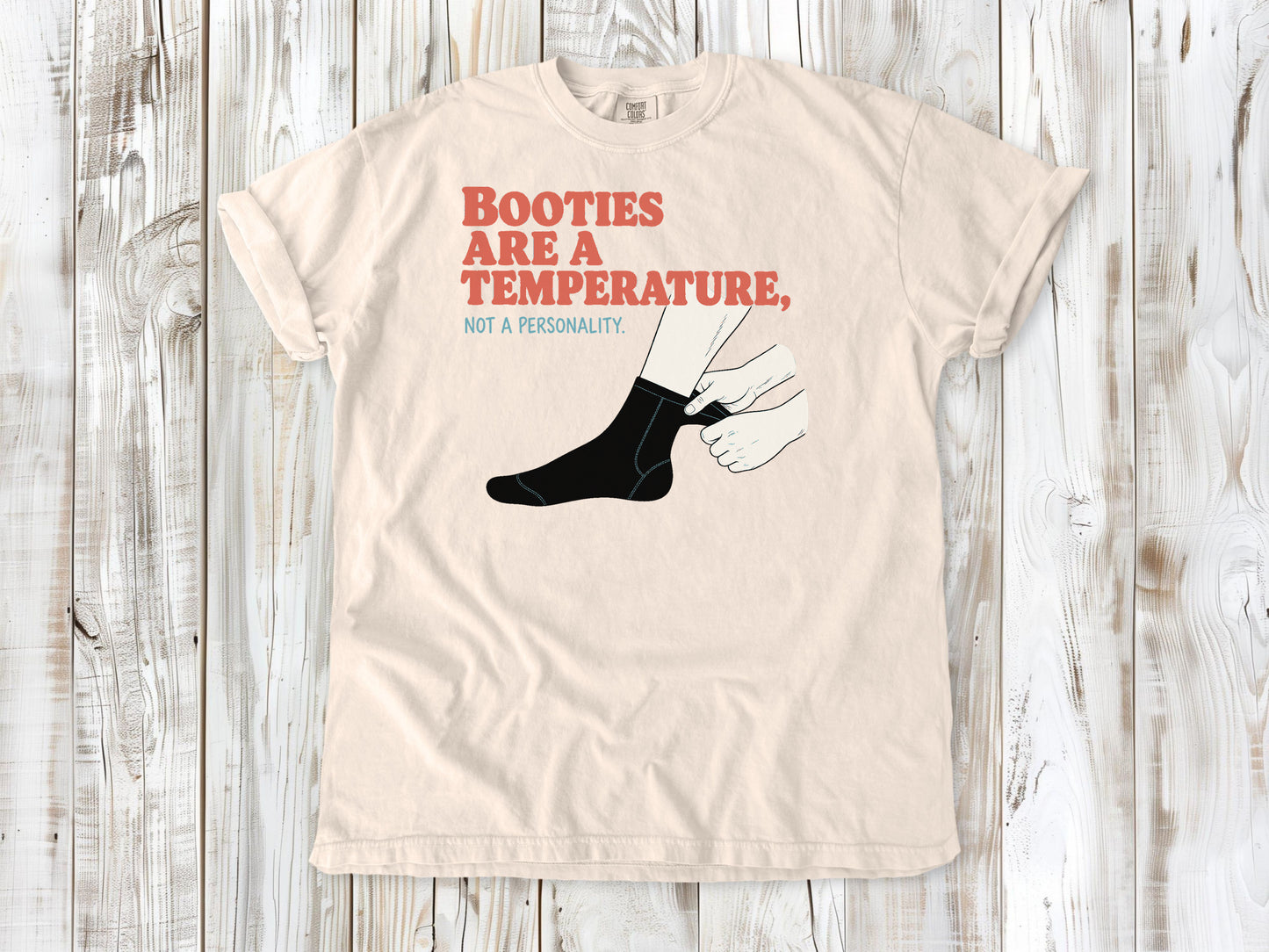 Butter garment-dyed tee with Booties Are a Temperature Not a Personality cold water surfing graphic.