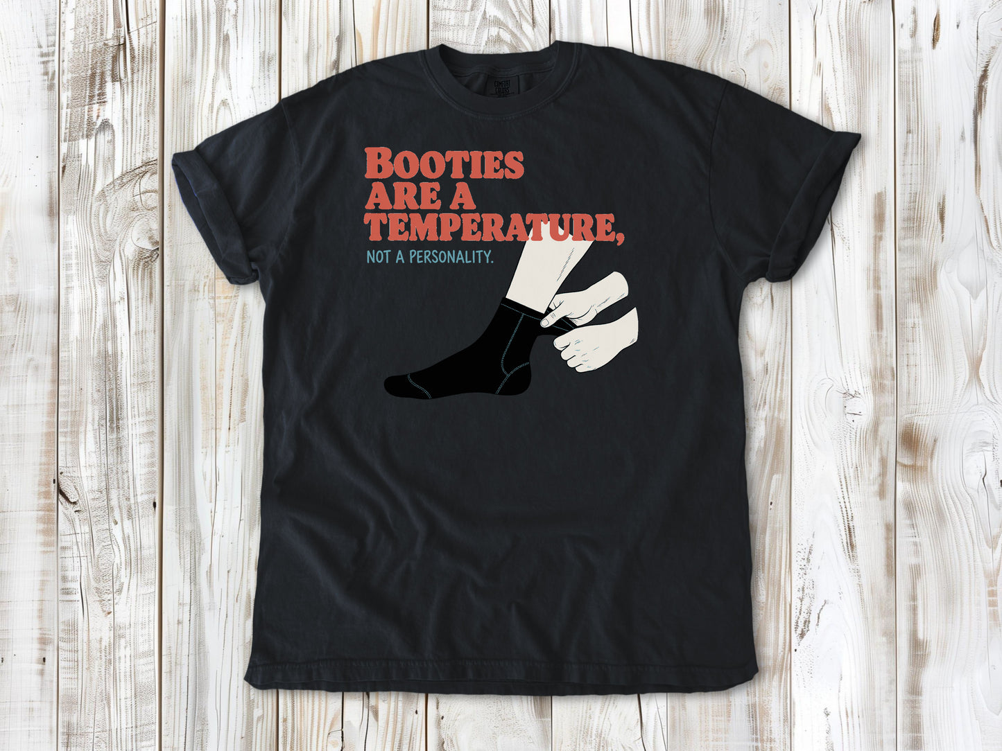 Washed Denim garment-dyed tee with Booties Are a Temperature Not a Personality cold water surfing graphic.
