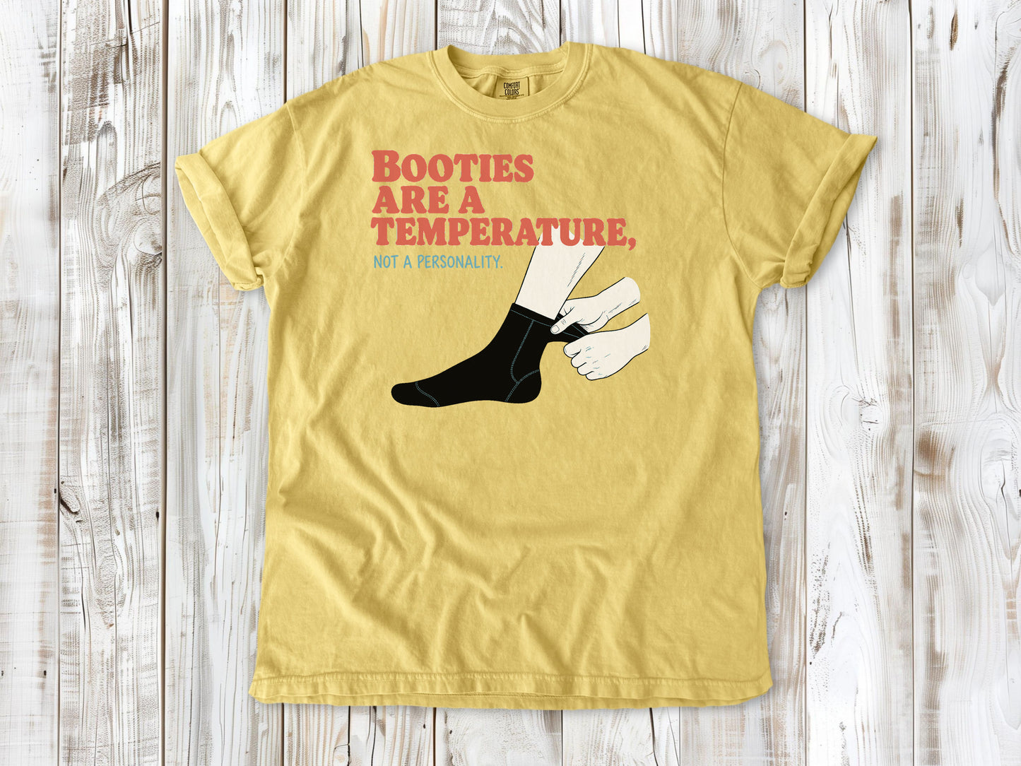 Grey garment-dyed tee with Booties Are a Temperature Not a Personality cold water surfing graphic.