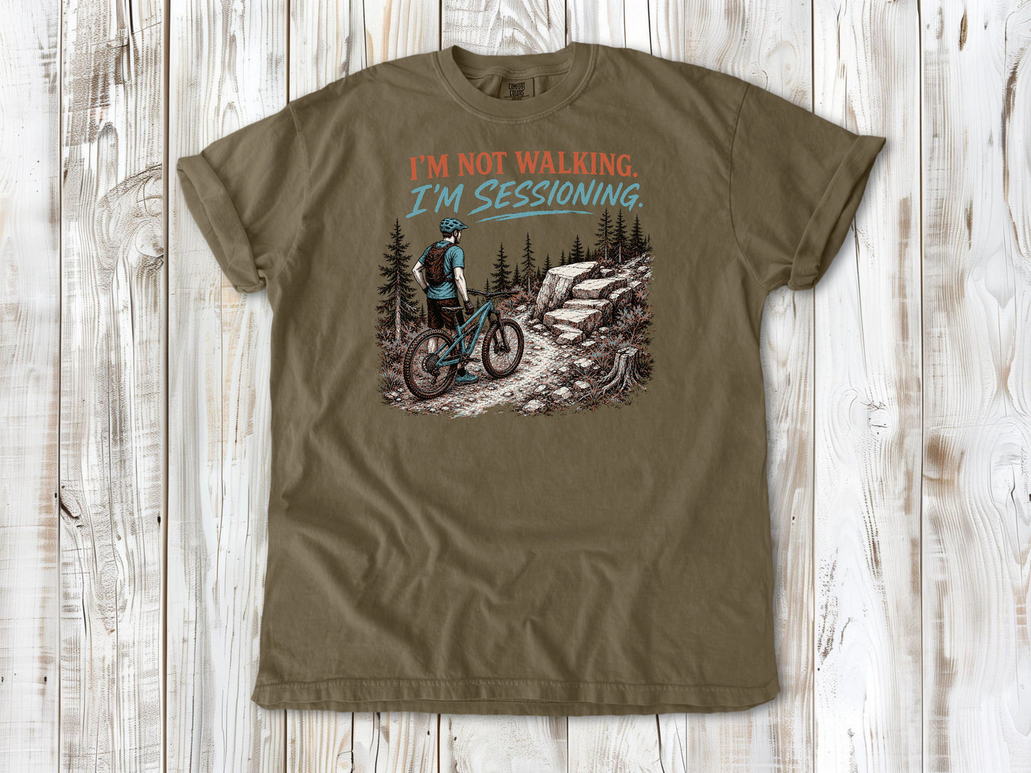 Graphite garment-dyed tee with I'm Not Walking I'm Sessioning mountain biking graphic.