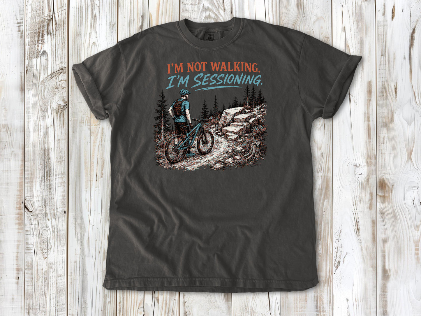 Ivory garment-dyed tee with I'm Not Walking I'm Sessioning mountain biking graphic.