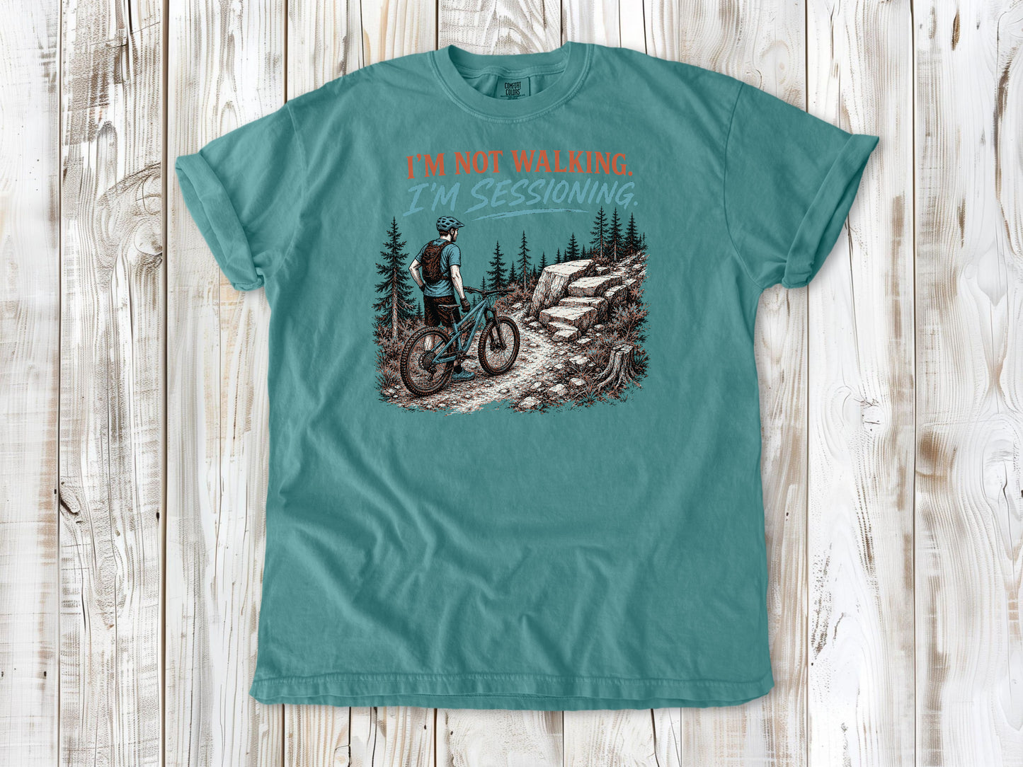Mustard garment-dyed tee with I'm Not Walking I'm Sessioning mountain biking graphic.