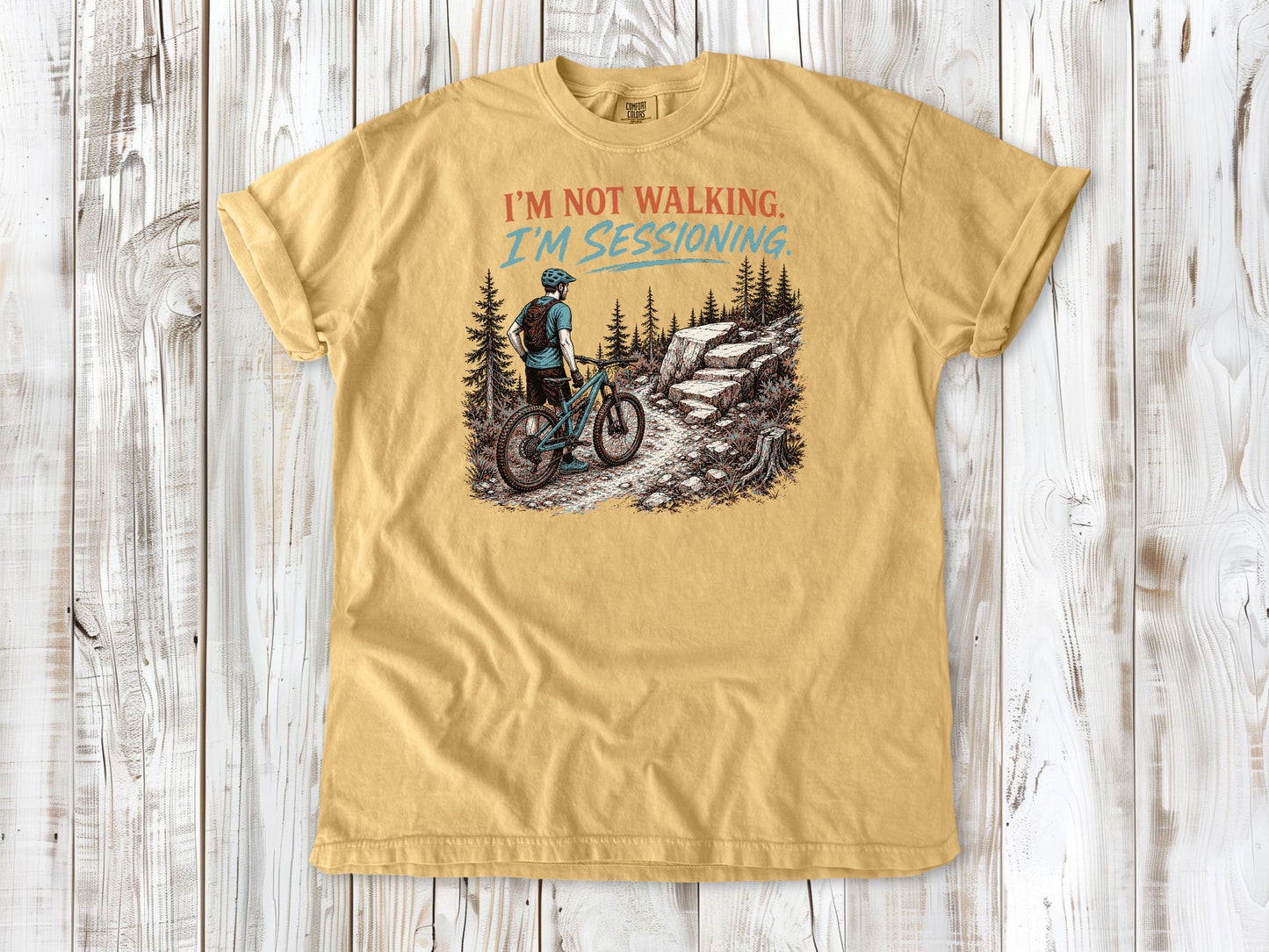 Burnt Orange garment-dyed tee with I'm Not Walking I'm Sessioning mountain biking graphic.