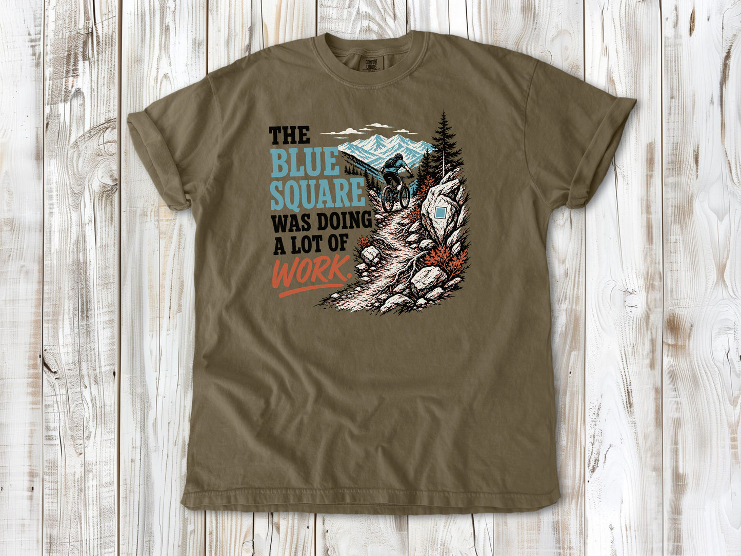 Graphite garment-dyed tee with The Blue Square Was Doing a Lot of Work mountain bike trail graphic.