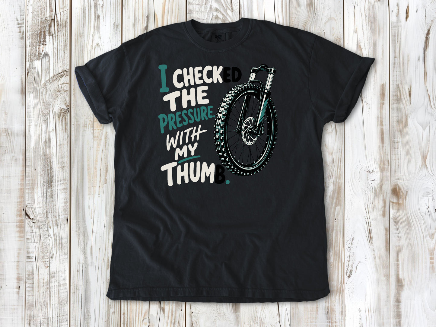 Washed Denim garment-dyed tee with I Checked the Pressure With My Thumb mountain bike tire graphic.