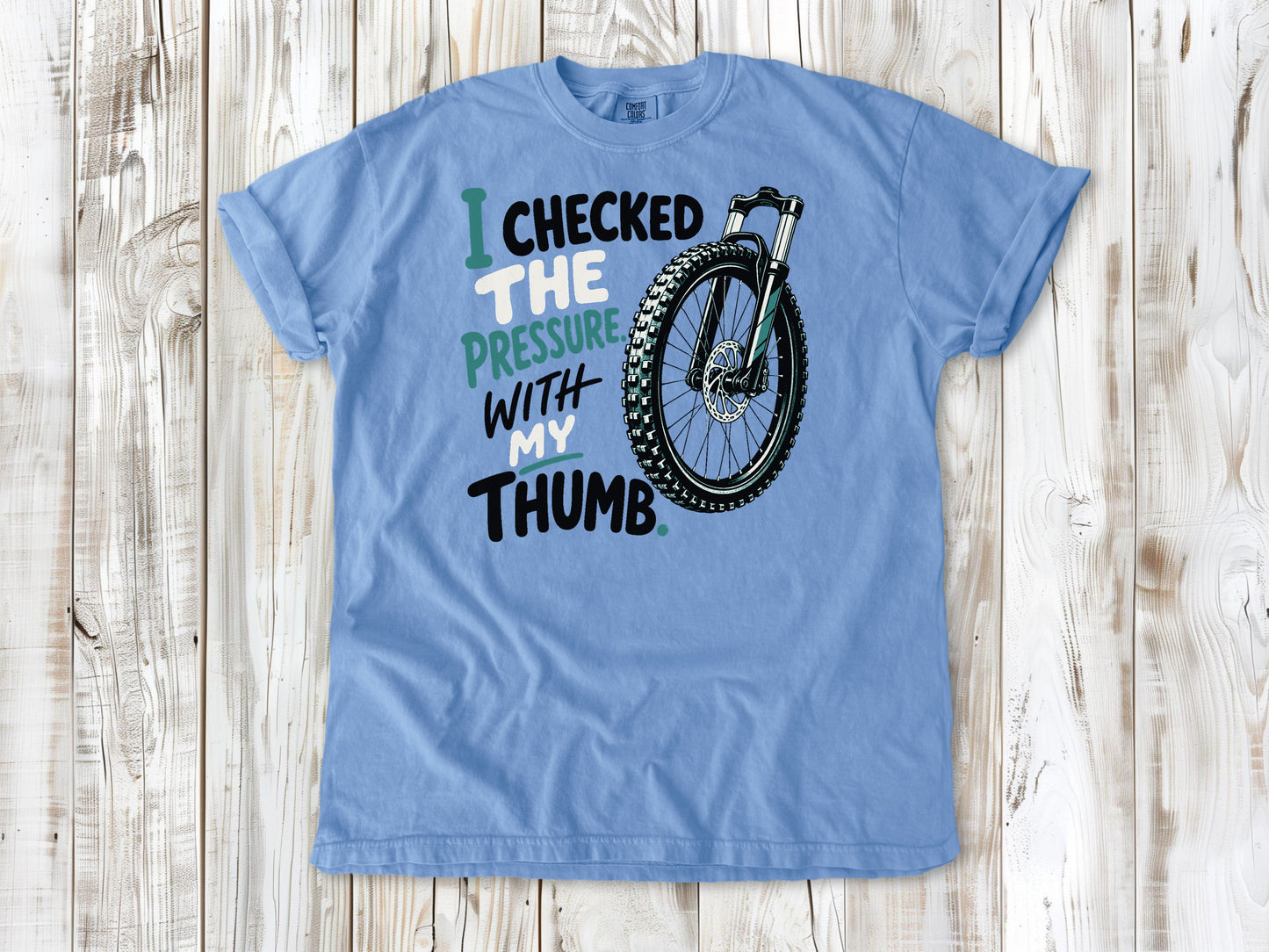 Pepper garment-dyed tee with I Checked the Pressure With My Thumb mountain bike tire graphic.